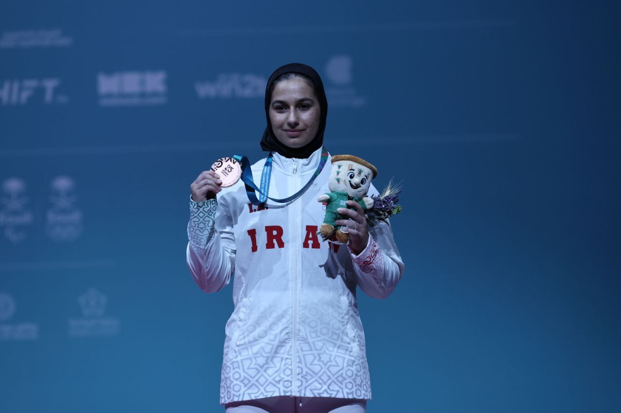 عکس ریحانه کریمی وزنه‌بردار